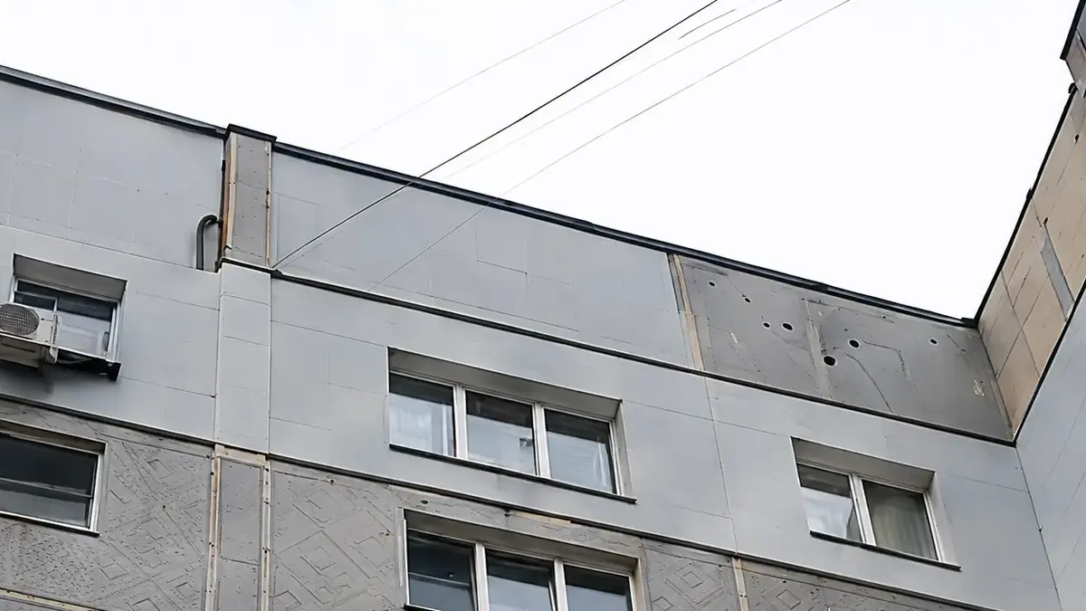 Готовый фасад панельного дома после утепления квартир